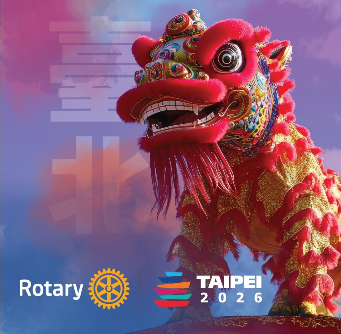 A red and yellow dragon statue on top of a building