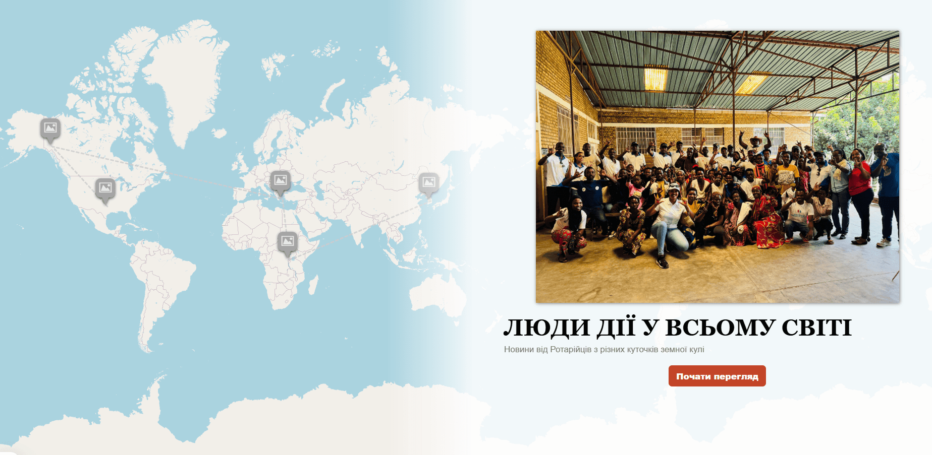 A group of people standing in front of a map