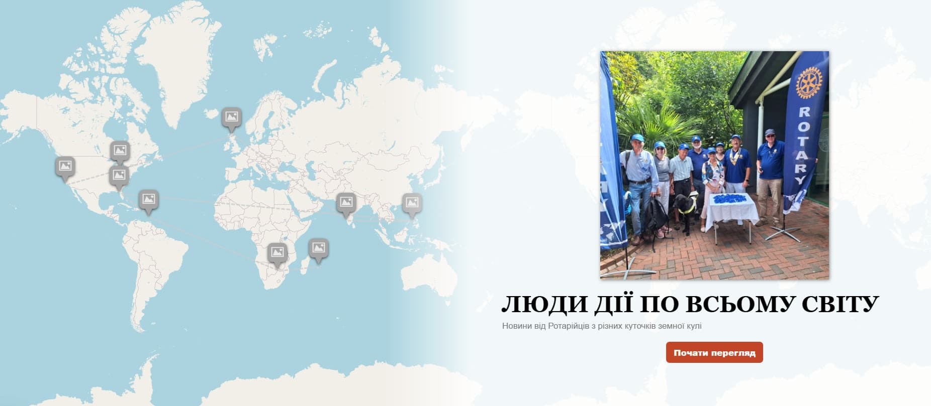 A group of people standing in front of a map