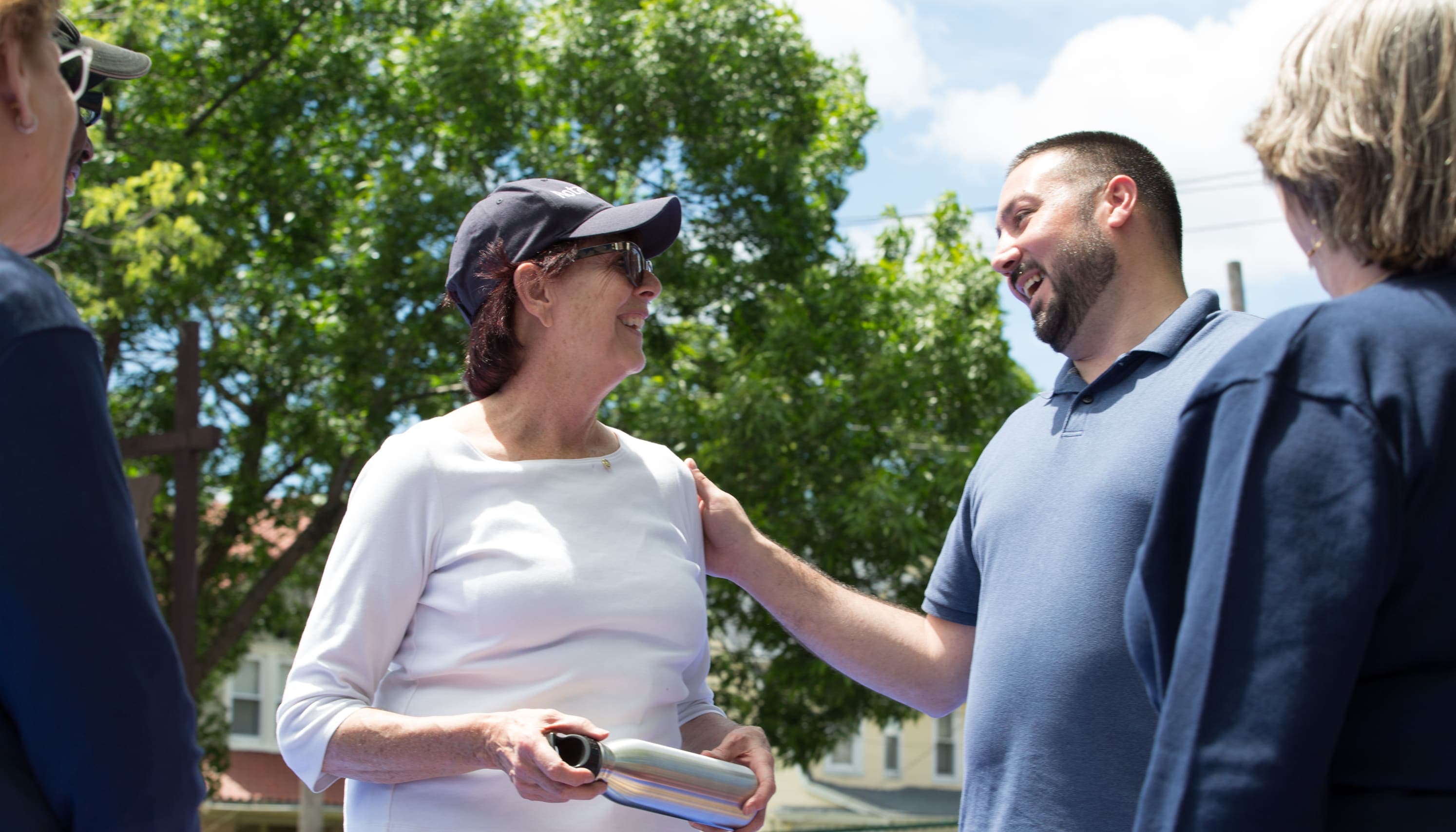 A group of people standing next to each other
