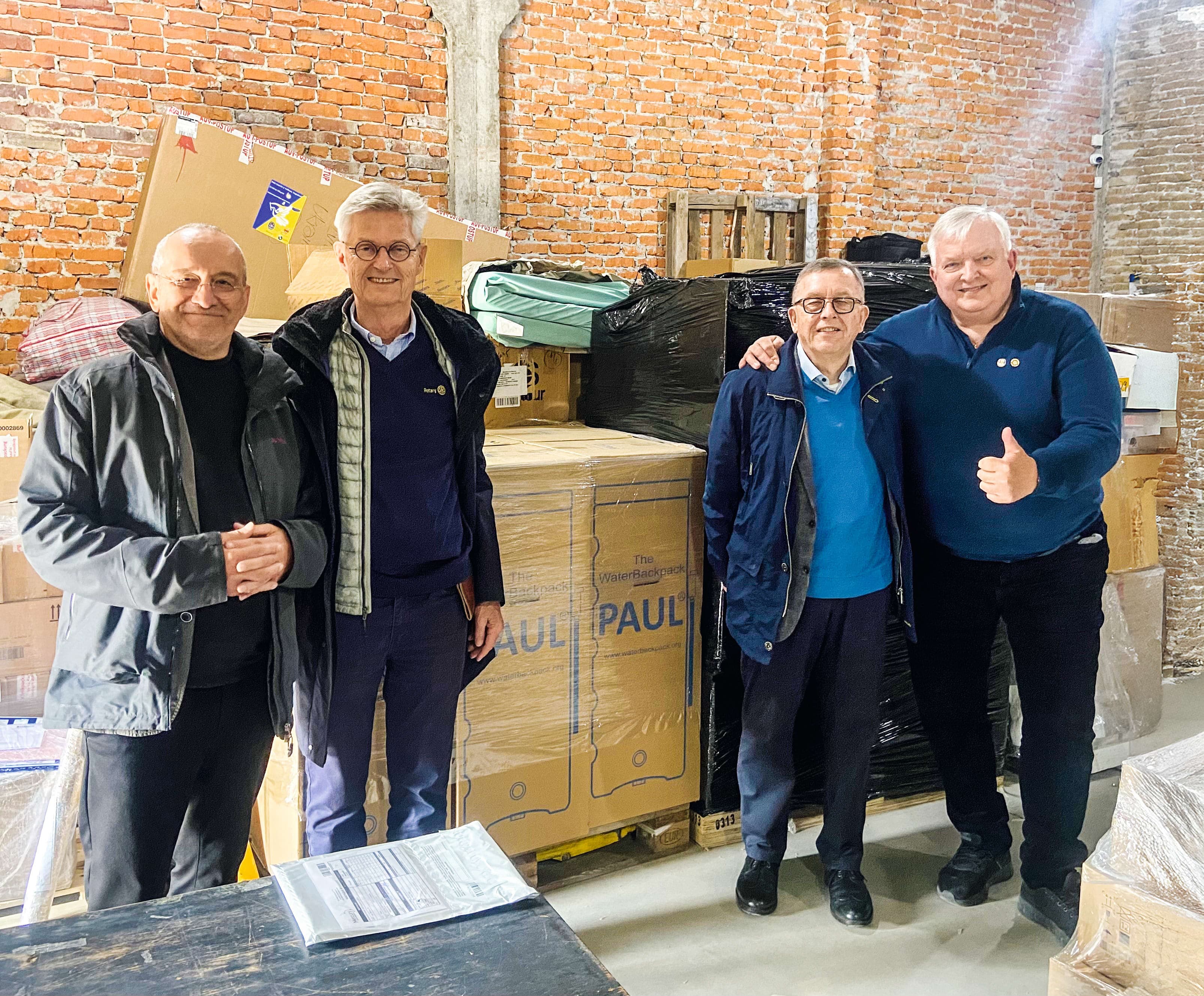 A group of men standing next to each other