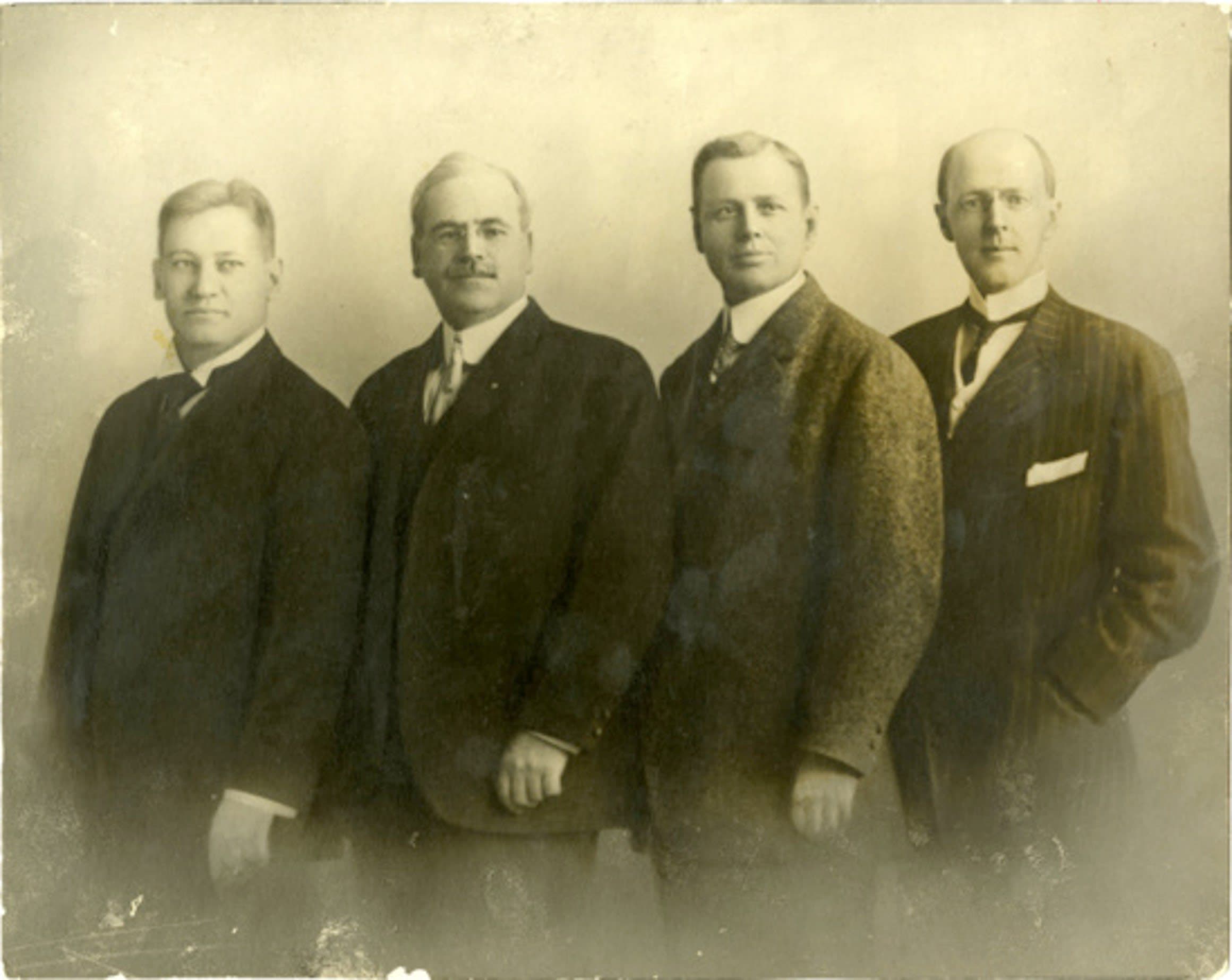 A group of men standing next to each other