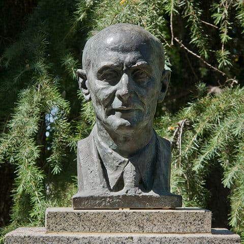 A statue of a man in a suit and tie