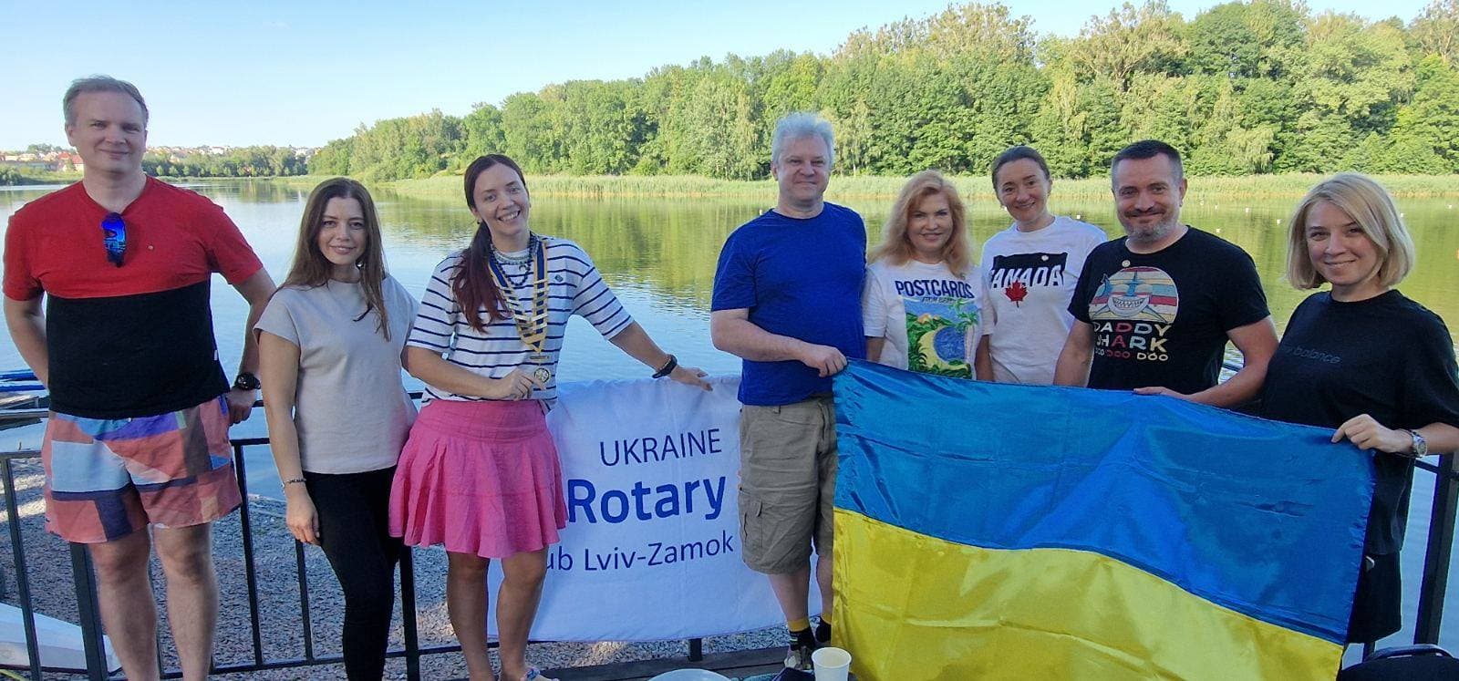 A group of people standing next to each other