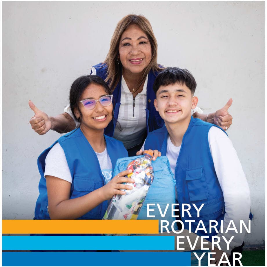 A woman and two children posing for a picture