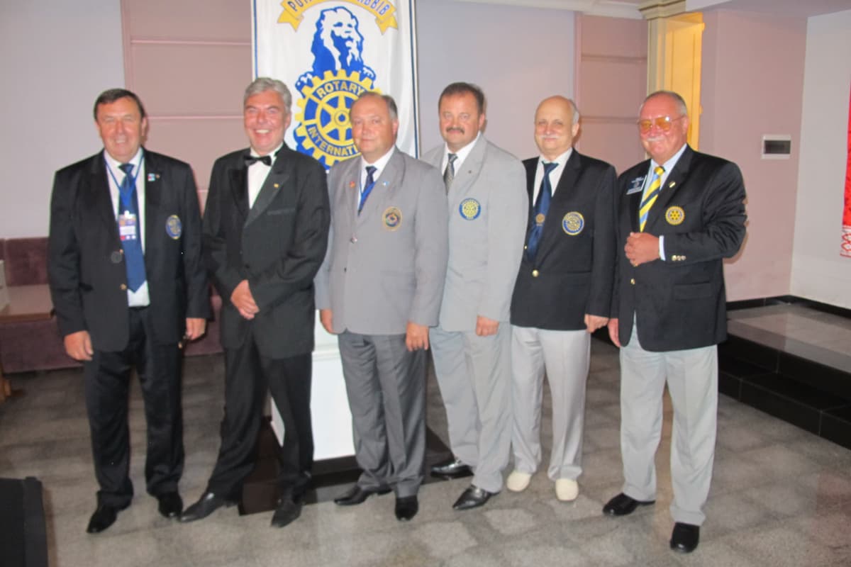 A group of men standing next to each other