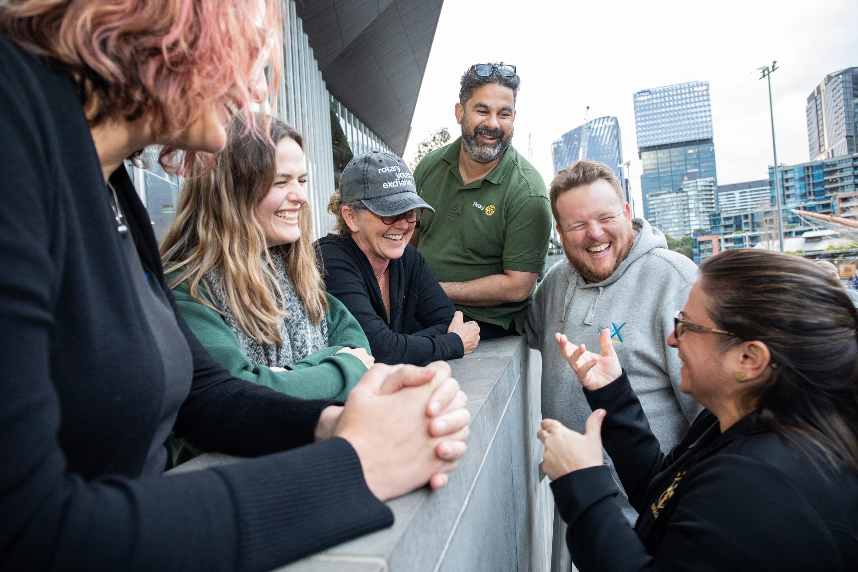 A group of people standing next to each other