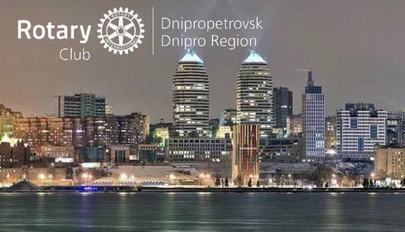 A picture of a city at night with the words rotaryy on it