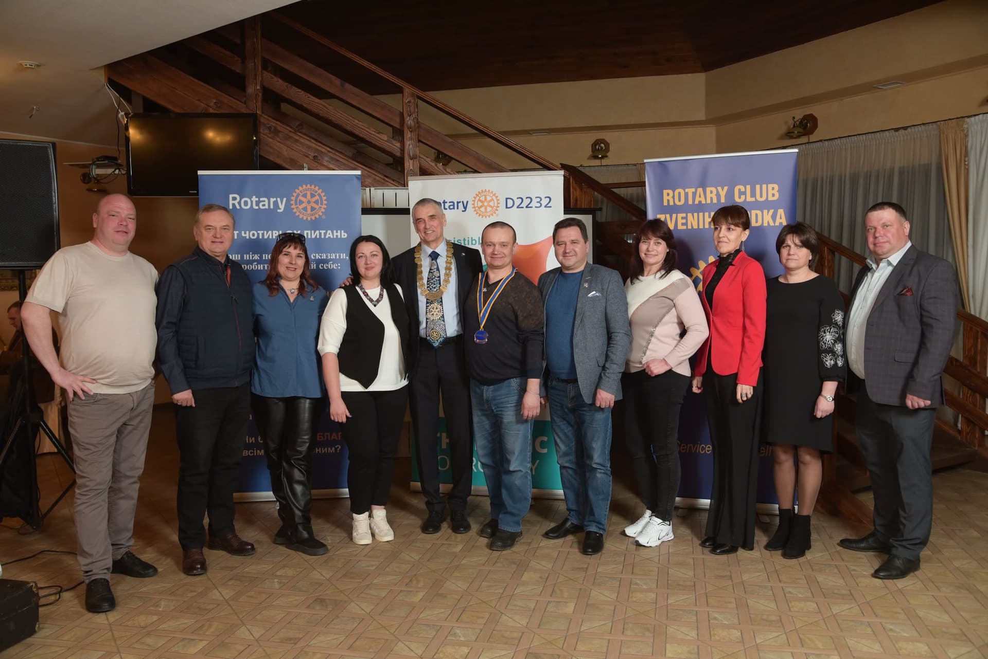 A group of people standing next to each other