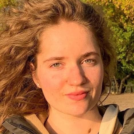 A close up of a person wearing a jacket